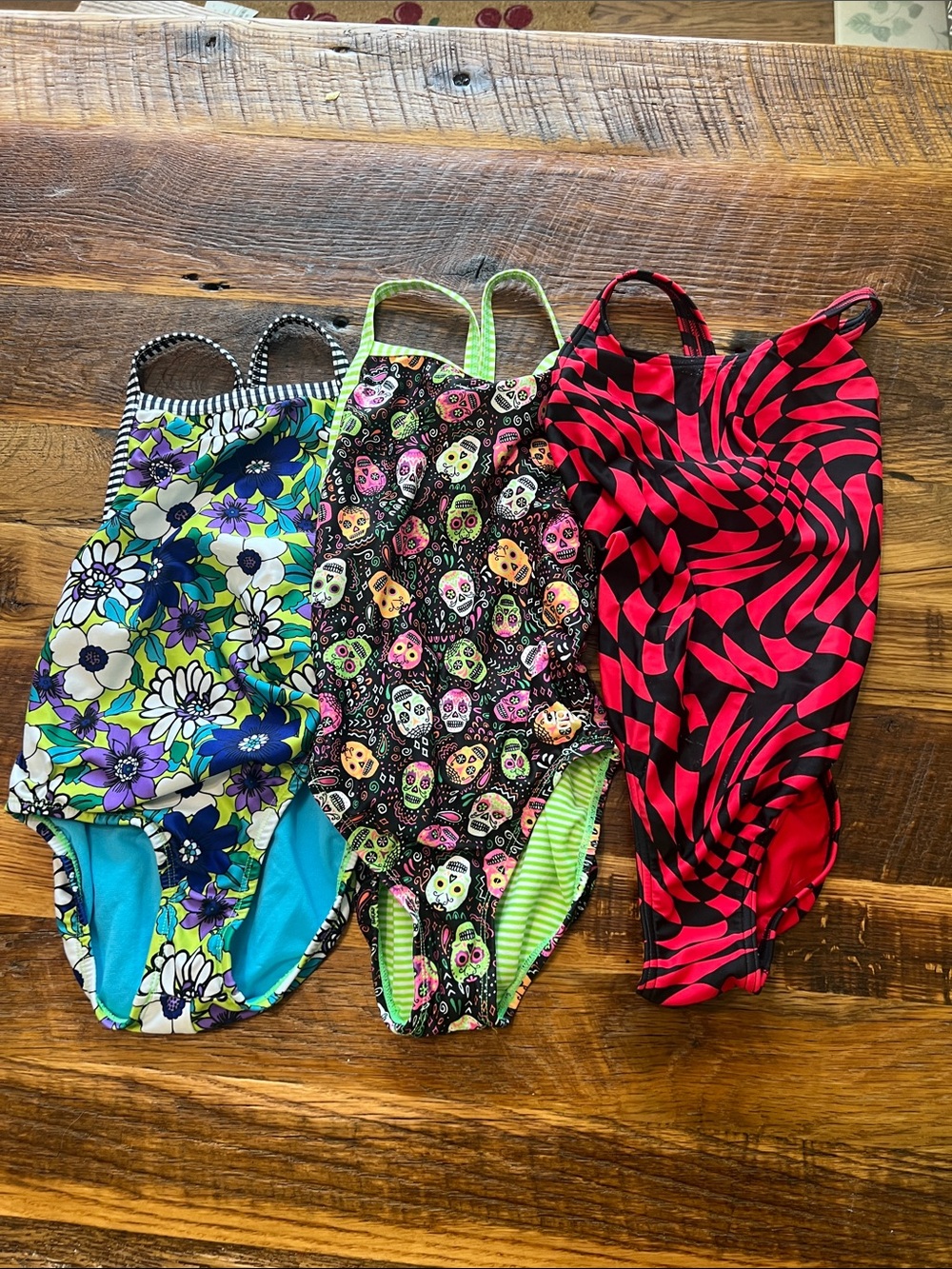 Kids One-Piece Swimsuit in Multicolor Floral, Skull & Red Patterns